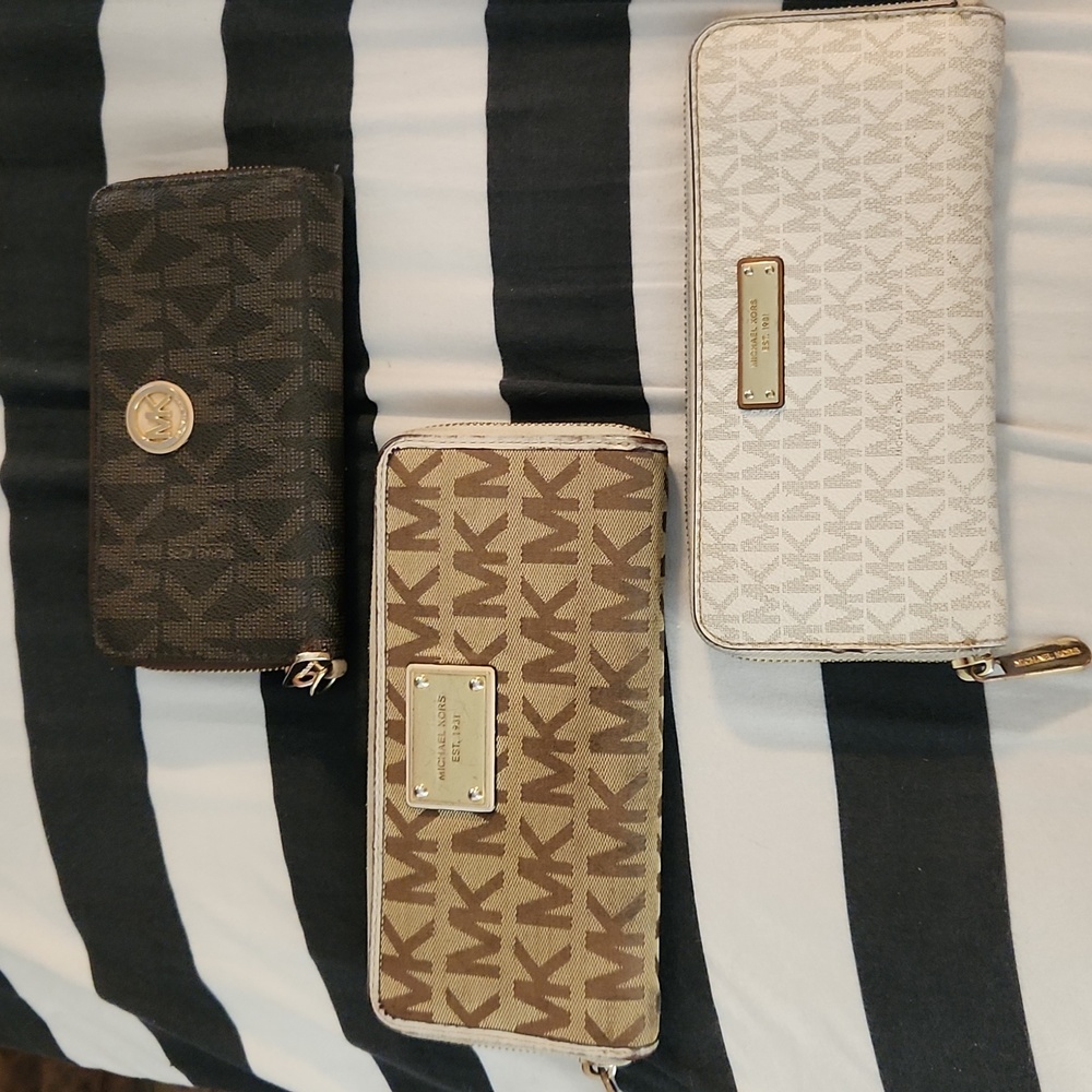 3 Michael Kors wallets